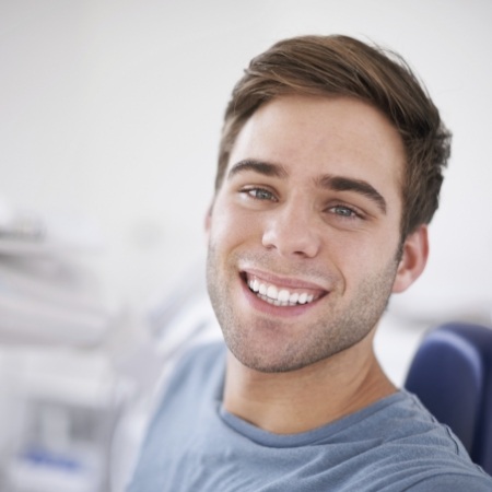 Man with healthy smile thanks to metal free dental restorations