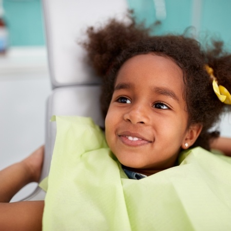 Child smiling during kids dentistry visit