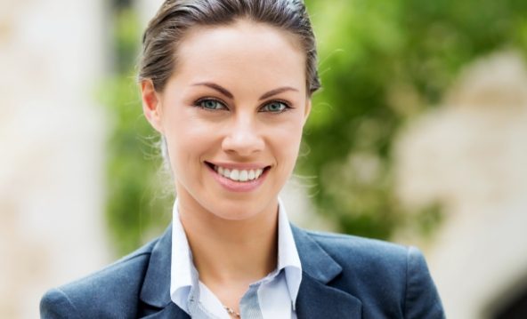 Woman with flawless smile after cosmetic dentistry